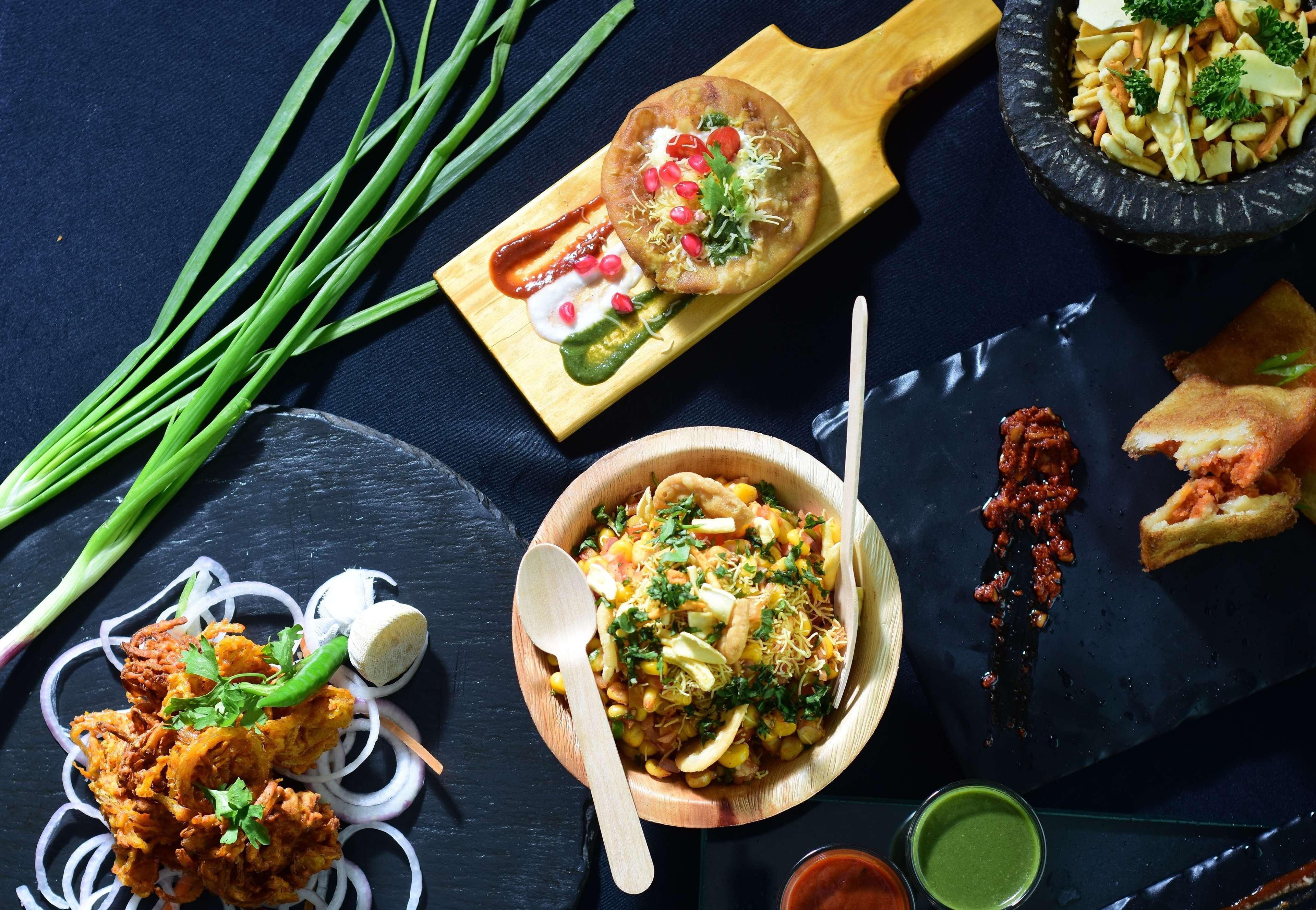 Hilton Mumbai International Airport Hotel Exteriör bild A selection of Indian snacks